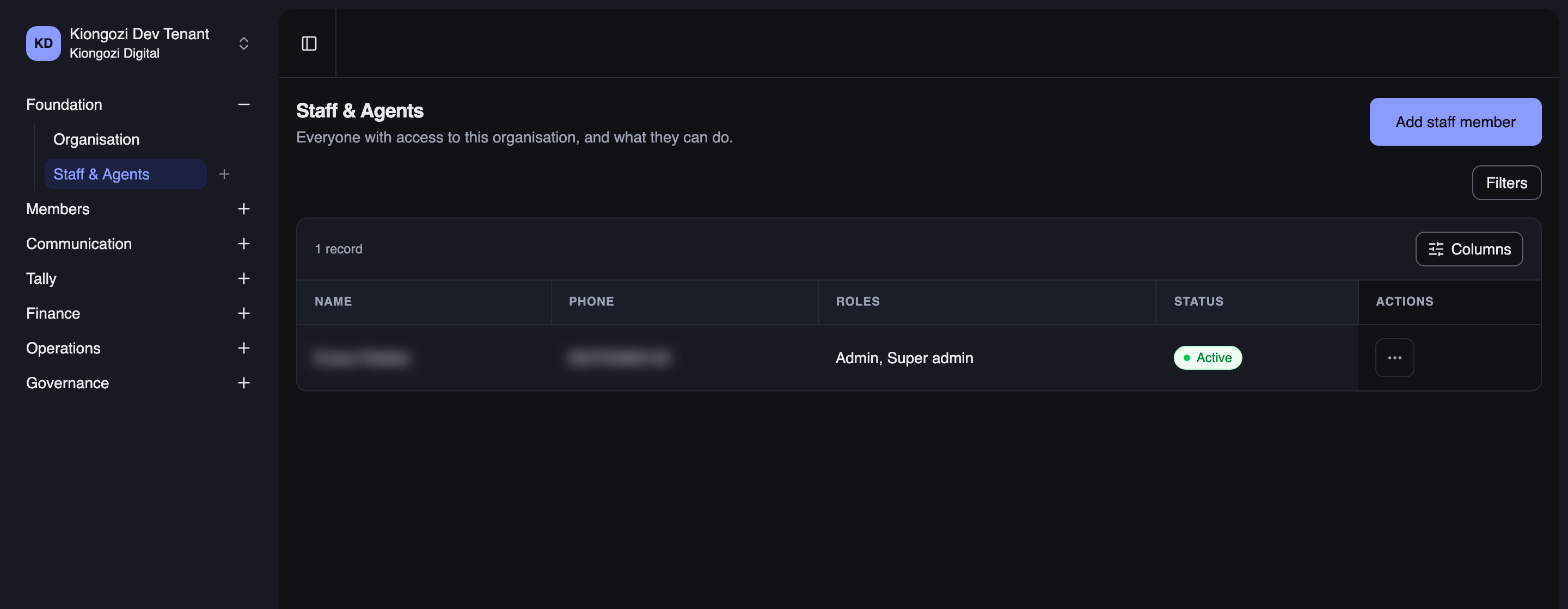 The staff and agents list, with role assignments and status — name and phone blurred for privacy